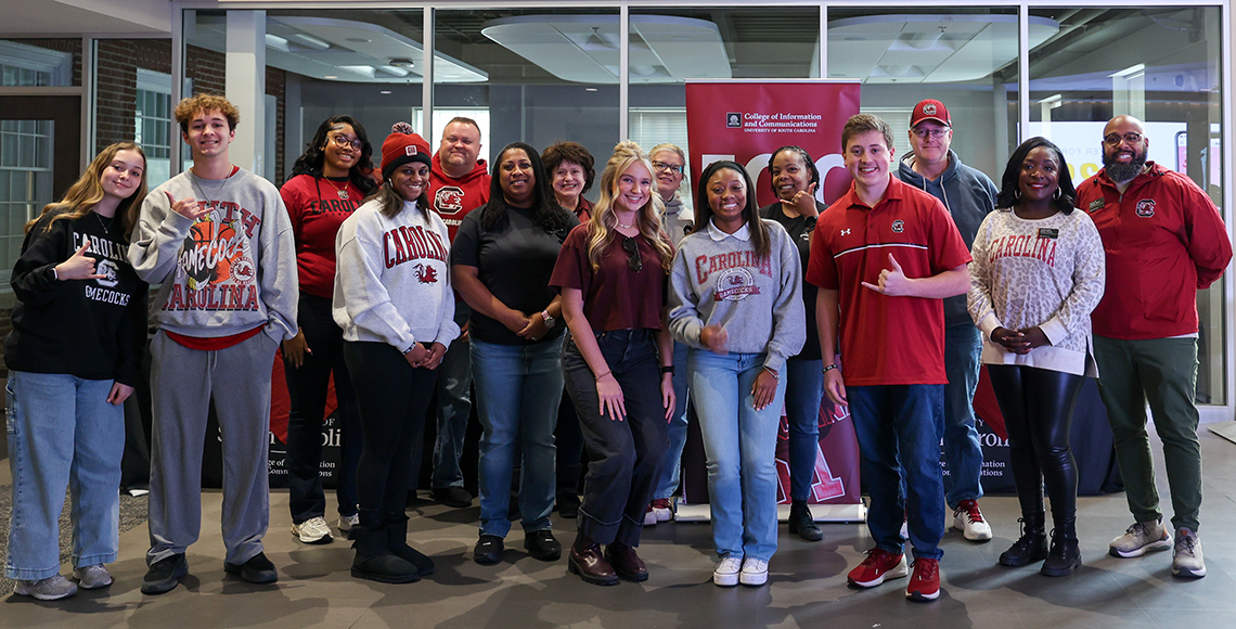 students in the SJMC lobby