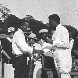 John Shippen accepting a trophy