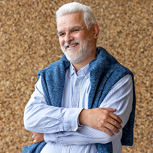 Ralf Gothe stands outside a building